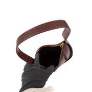 Shop safe online at Labellov in Antwerp, Brussels and Knokke this 100% authentic second hand The Row Raisin Shiny Kid Leather Half Moon Bag. Veilig online tweedehands authentieke The Row Raisin Shiny Kid Leather Half Moon handtas kopen bij Labellov.