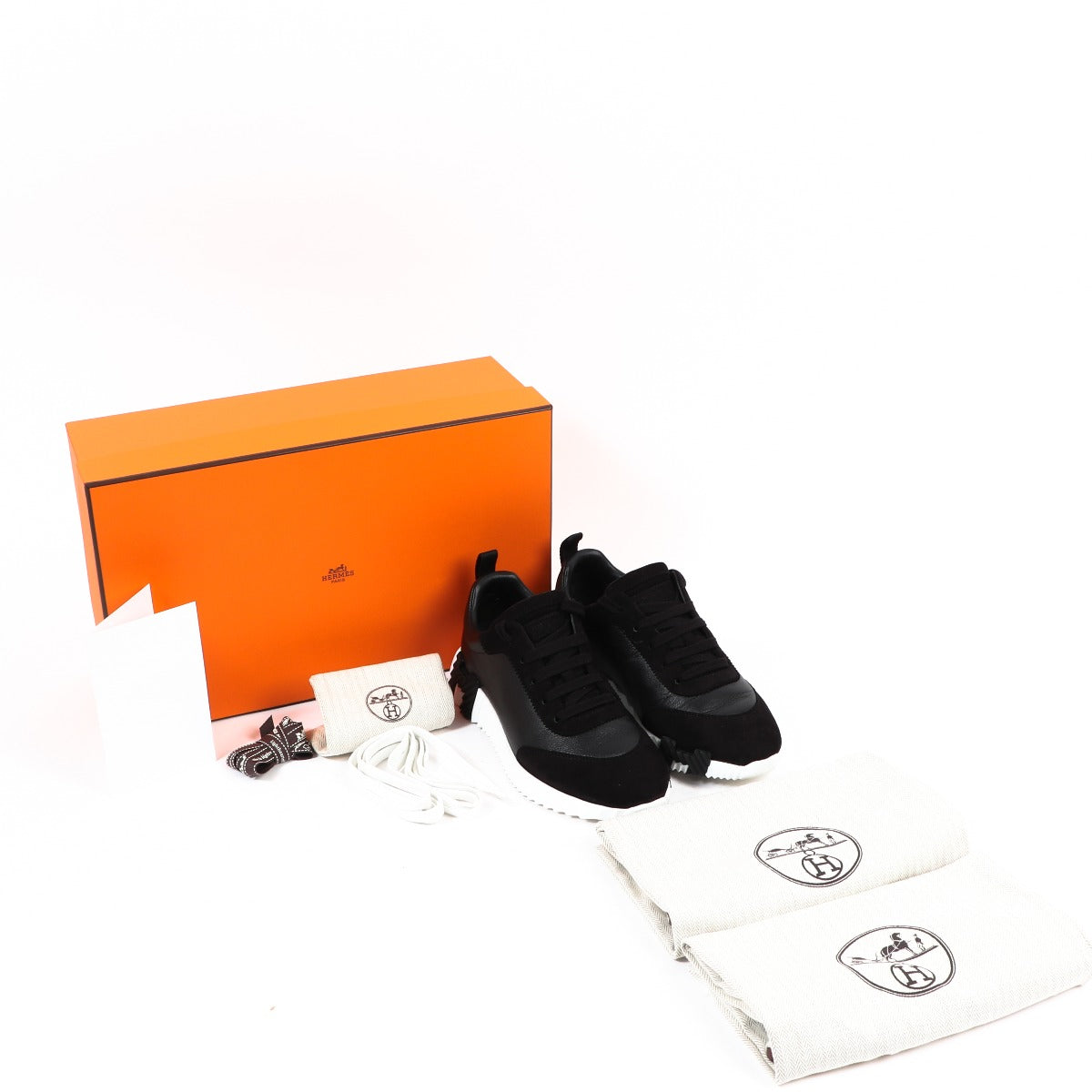 Buy authentic second-hand Hermès Black Calfskin Suede Goatskin Bouncing Sneakers Size - 38 in very good condition at Labellov in Antwerp.