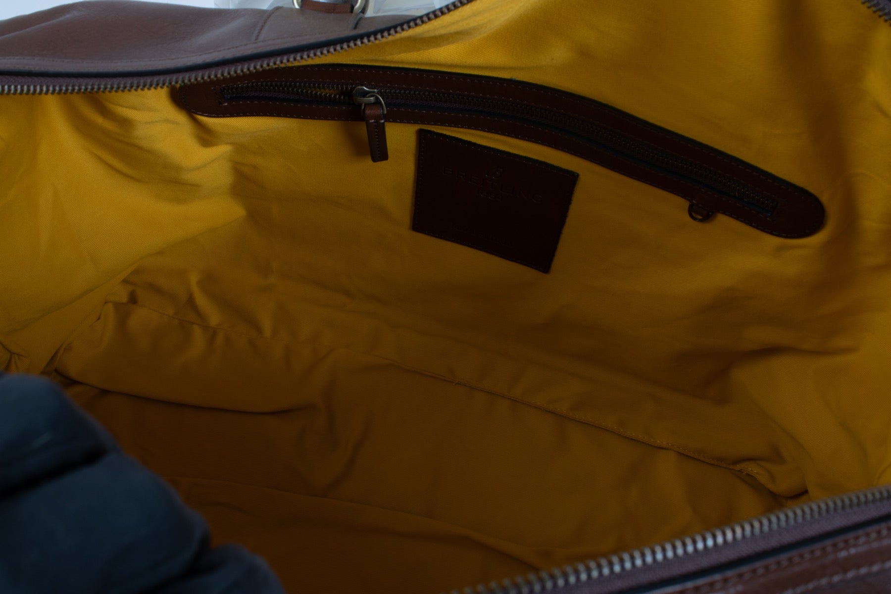 Authentic second hand Breitling Brown weekender bag Top Handle Bag on Labellov.com