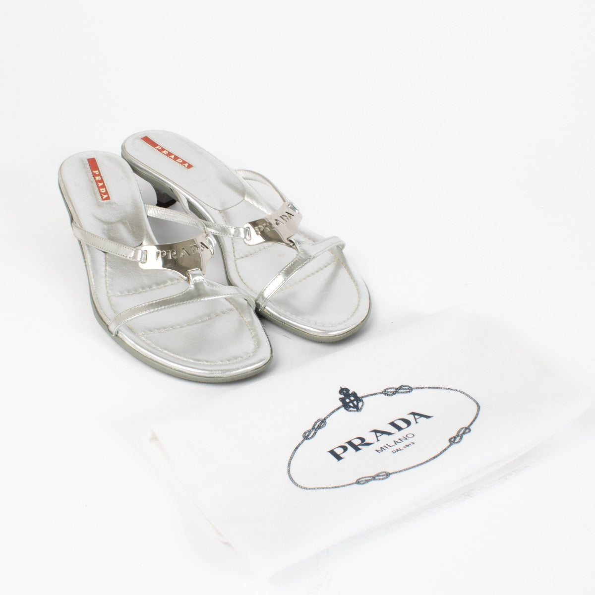 authentic preloved Prada Silver Heels - size 37,5 on Labellov.com