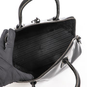 Buy an authentic second-hand Prada Black Patent Leather Spazzolato Logo Top Handle Bag in very good condition at Labellov in Antwerp.