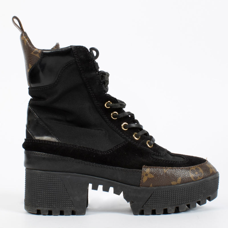 Authentic Louis Vuitton Black Desert Boots in good pre-loved condition, available at Labellov.com.