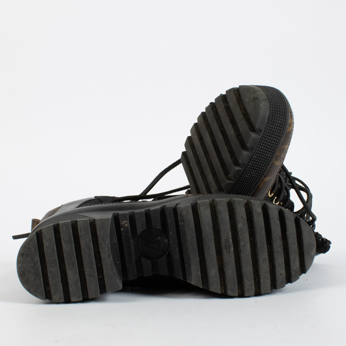 Authentic Louis Vuitton Black Desert Boots in good pre-loved condition, available at Labellov.com.