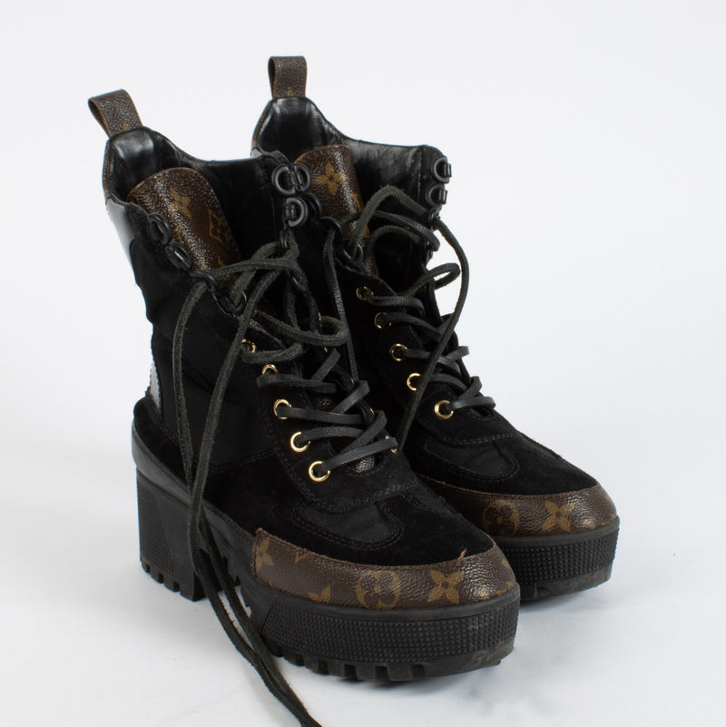 Authentic Louis Vuitton Black Desert Boots in good pre-loved condition, available at Labellov.com.