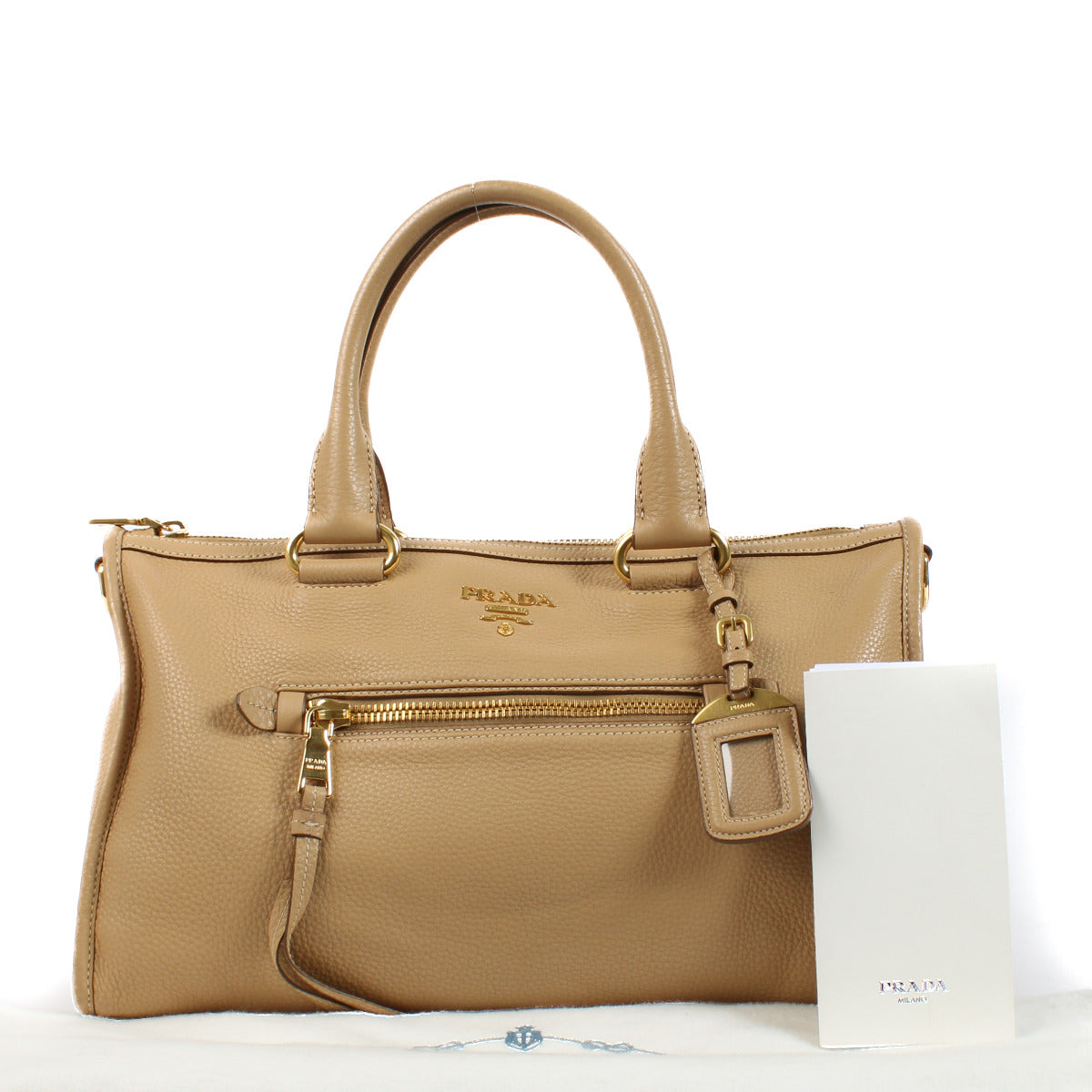 Are you looking for an authentic designer Prada Beige Calfskin Leather Bauletto Top Handle Bag? Shop and sell at Labellov.
