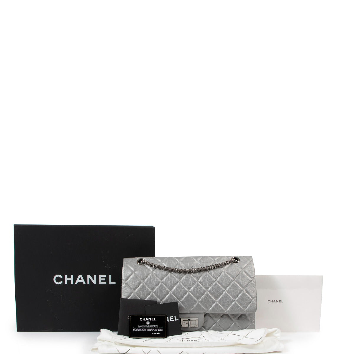 Buy an aunthentic second hand Chanel Silver Aged Calfskin Leather Maxi Reissue 2.55 in very good condition at Labellov.