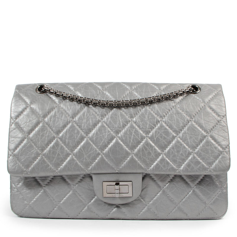 Buy an aunthentic second hand Chanel Silver Aged Calfskin Leather Maxi Reissue 2.55 in very good condition at Labellov.