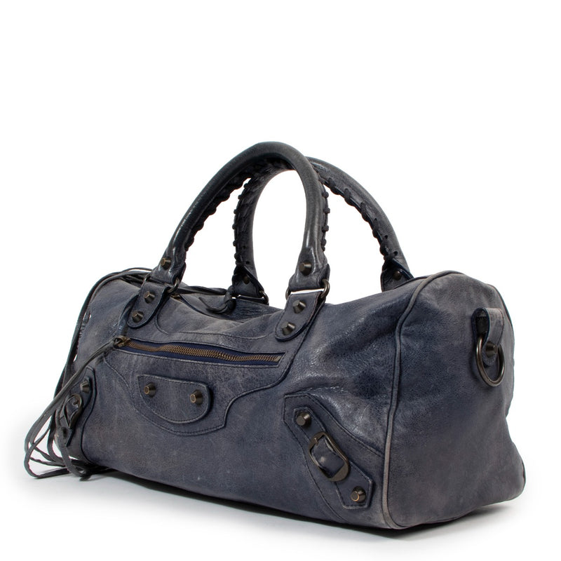 Buy an authentic second-hand Balenciaga Blue Lambskin Leather Classic Twiggy Top Handle Bag in good condition at Labellov Antwerp.