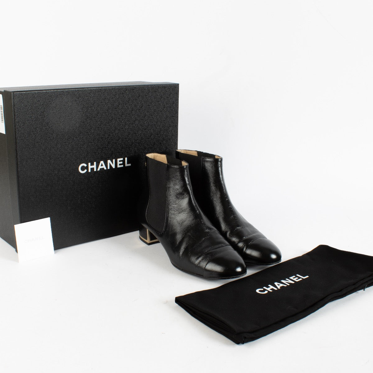 Shop safe online at Labellov in Antwerp, Brussels and KNokke these 100% authentic second hand Chanel Black Shiny Metal Heel Boots - size 38,5