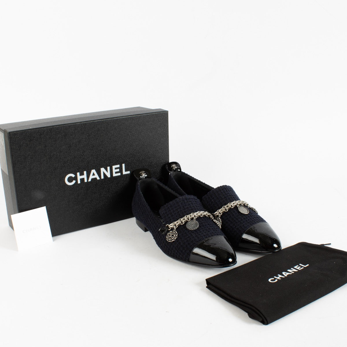 Shop safe online at Labellov in Antwerp, Brussels and Knokke these 100% authentic second hand Chanel Blue Tweed Charm Loafers - size 38,5