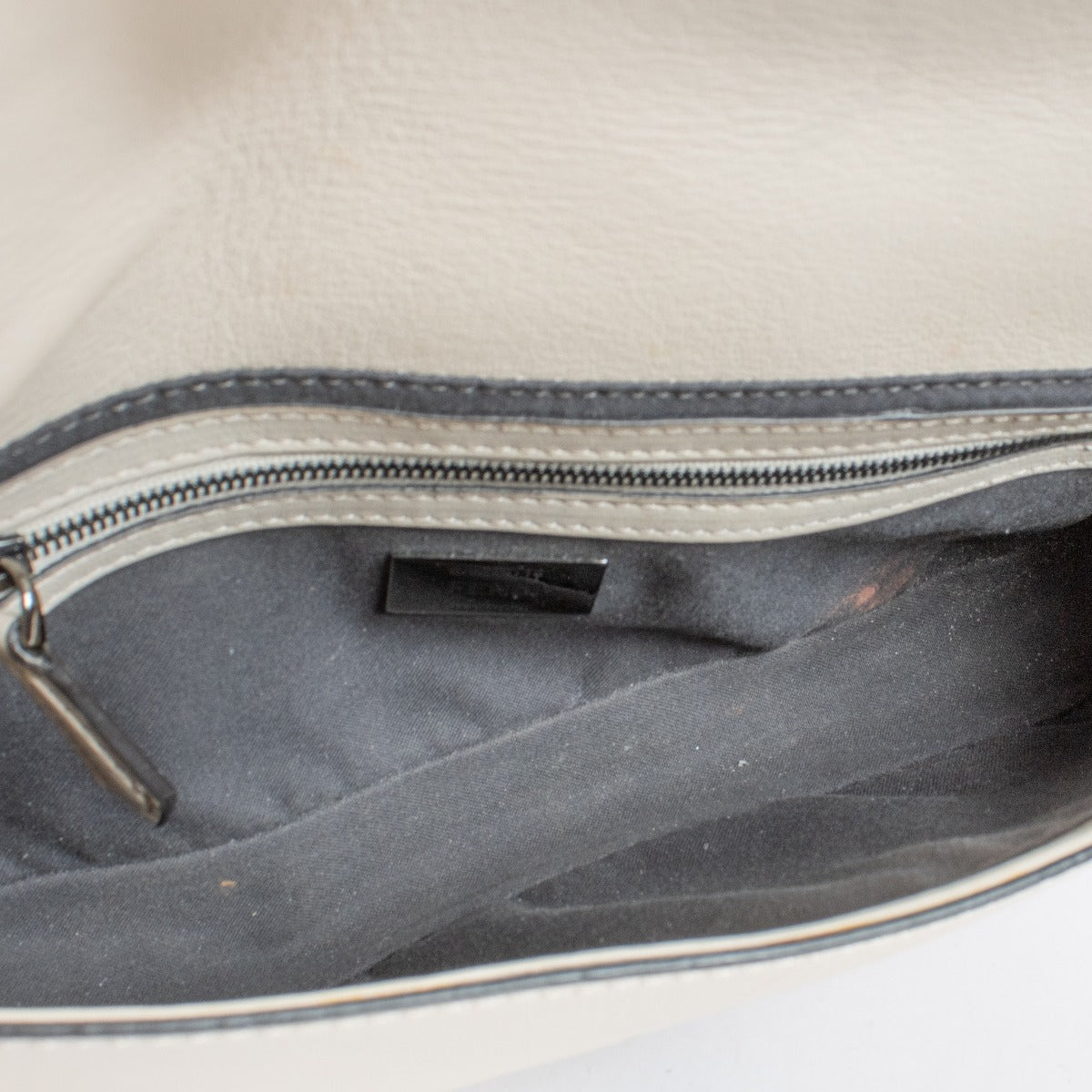 Fendi White Leather Whipstitch Baguette Bag with silver-tone FF hardware and leather strap at Labellov.com