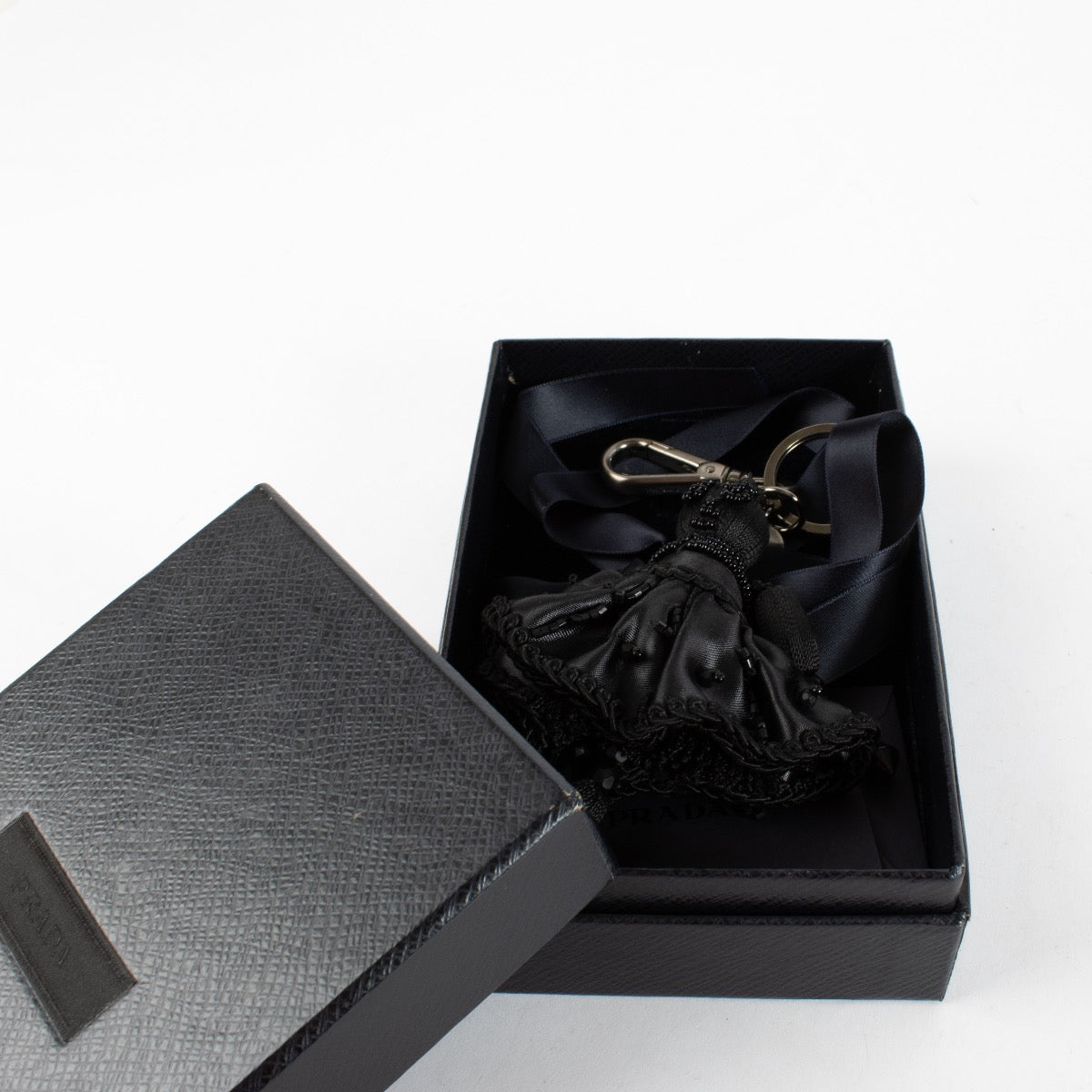 Authentic Preloved Prada Black Bag Charm on Labellov.com