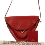 Shop safe online at Labellov in Antwerp, Brussels and Knokke this 100% authentic second hand Delvaux Red Grained Leather Triangle Crossbody Bag