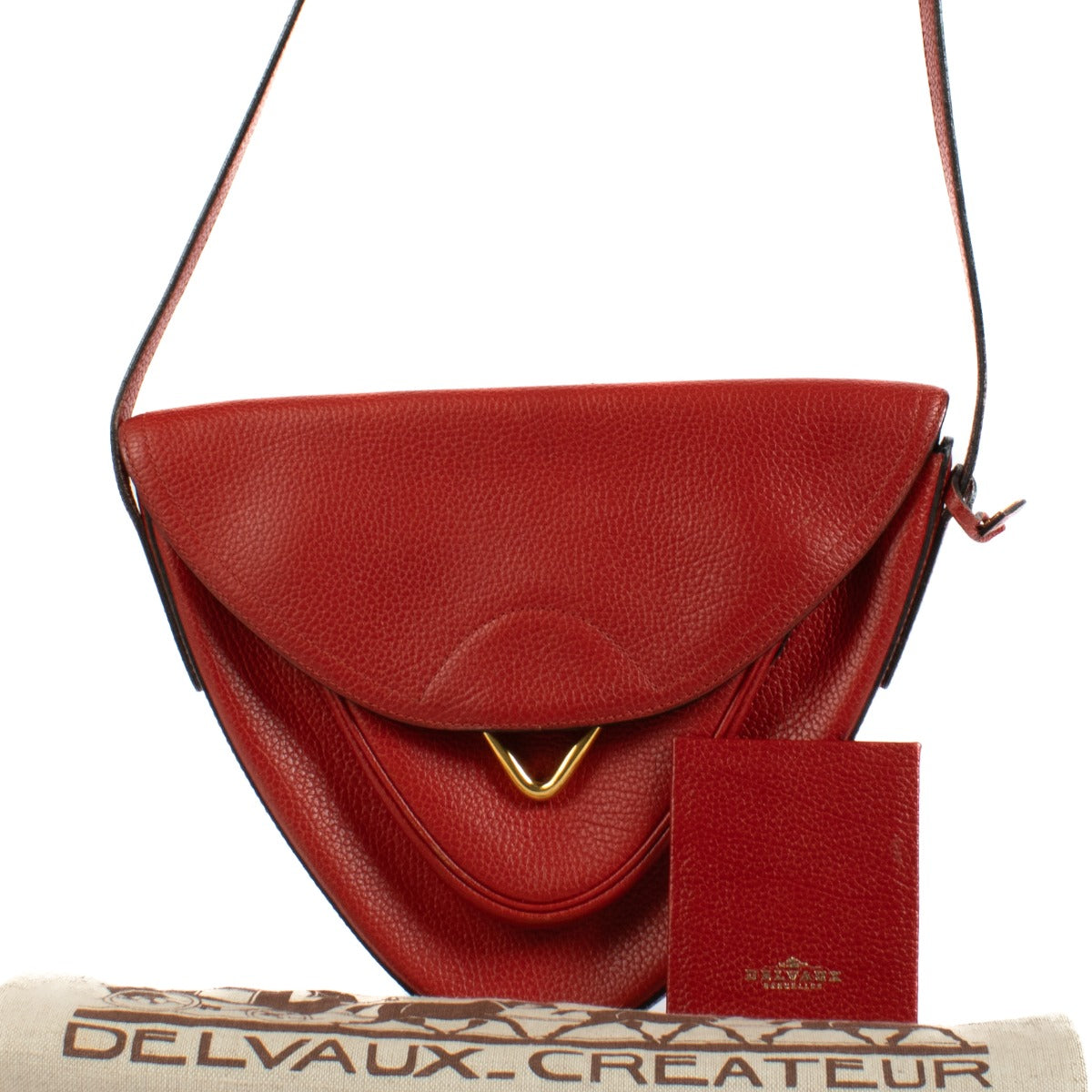 Shop safe online at Labellov in Antwerp, Brussels and Knokke this 100% authentic second hand Delvaux Red Grained Leather Triangle Crossbody Bag