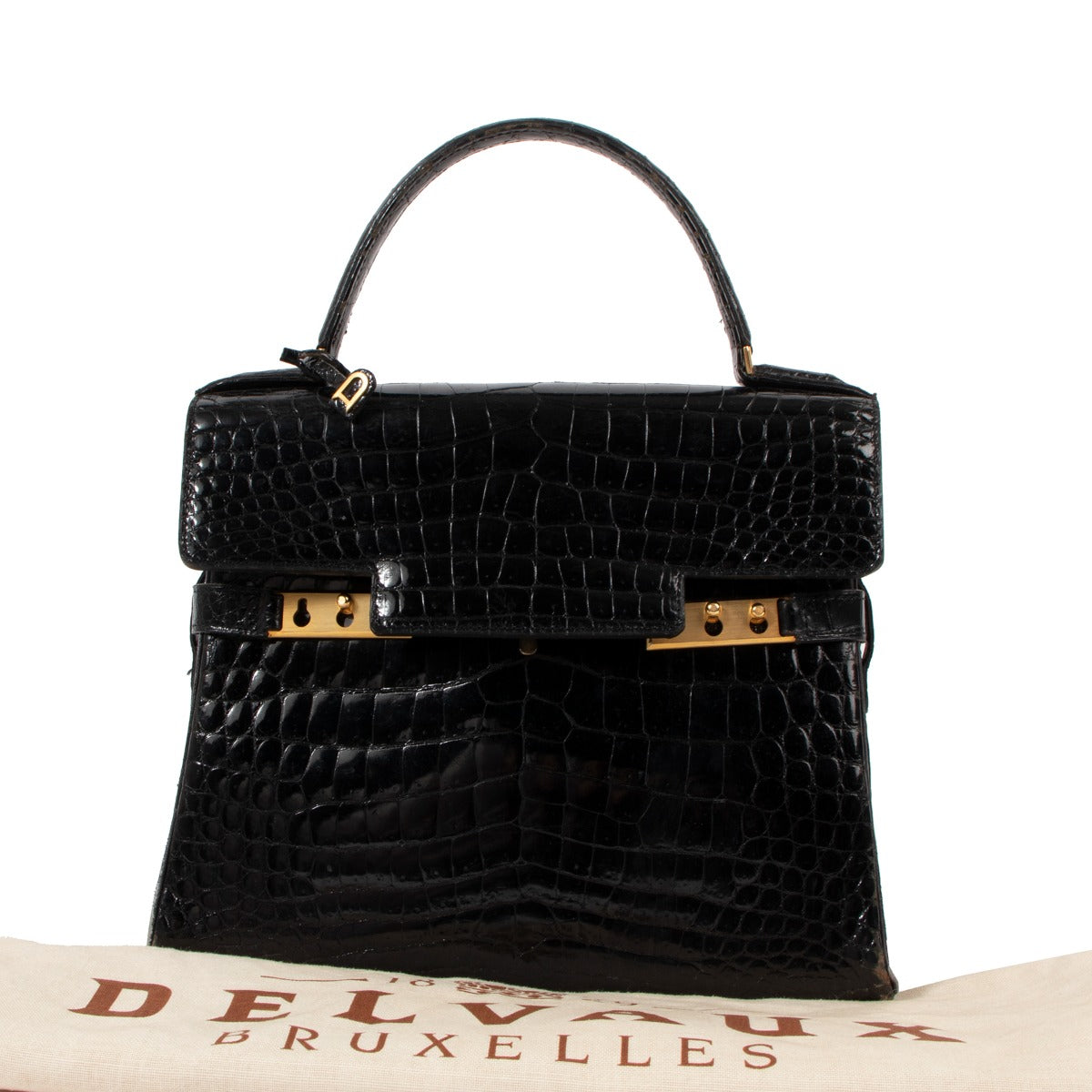 Buy a vintage original Delvaux Black Crocodile Leather Tempête Top Handle Bag in preloved condition at Labellov Antwerp.