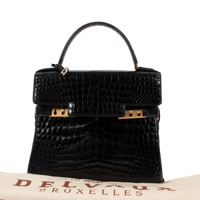 Buy a vintage original Delvaux Black Crocodile Leather Tempête Top Handle Bag in preloved condition at Labellov Antwerp.