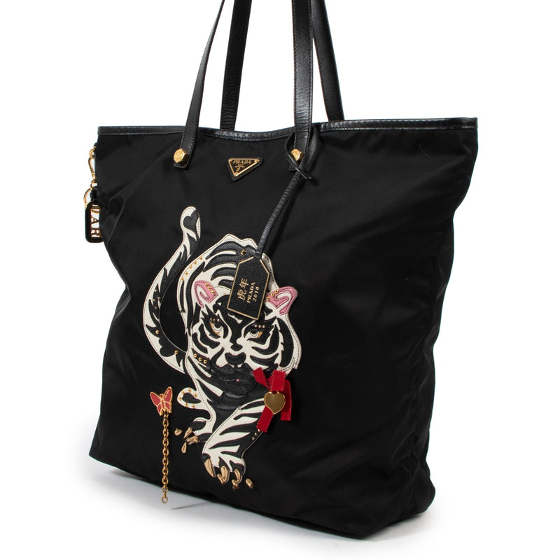 Buy an authentic second hand Prada Black Nylon Year Of Tiger Tote Bag in good condition at Labellov Antwerp.