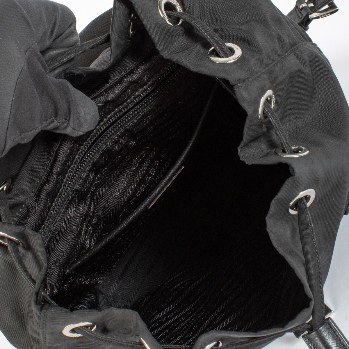Authentic preloved Prada Small Black Re-Nylon Backpack on Labellov.com