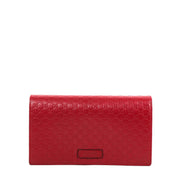 Buy an authentic second-hand Gucci Hibiscus Red Microguccissima Wallet On Strap in very good condition at Labellov in Antwerp.