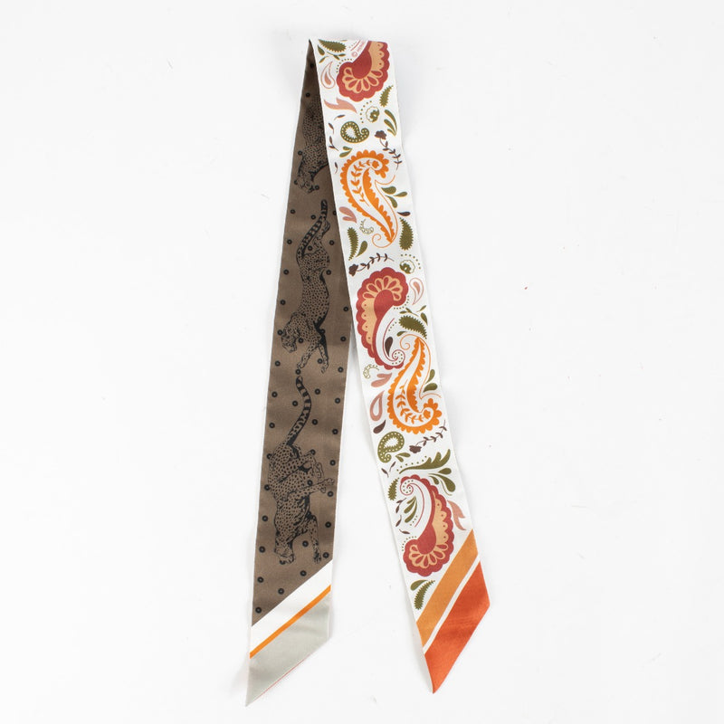 Authentic preloved Hermès Twilly Guepards Bandana Scarf on Labellov.com