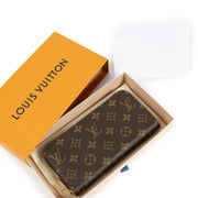Louis Vuitton Monogram Zippy Wallet featuring iconic Monogram canvas, a secure all-round zip closure, multiple card slots, a zipped coin pocket, and a spacious interior lined with grained leather. Stylish and functional for everyday use.
