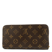 Louis Vuitton Monogram Zippy Wallet featuring iconic Monogram canvas, a secure all-round zip closure, multiple card slots, a zipped coin pocket, and a spacious interior lined with grained leather. Stylish and functional for everyday use.