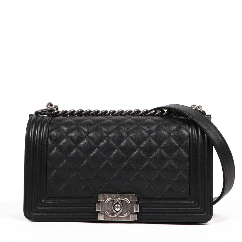Buy an authentic secondhand Chanel Black Caviar Medium Boy Bag in very good condition at Labellov