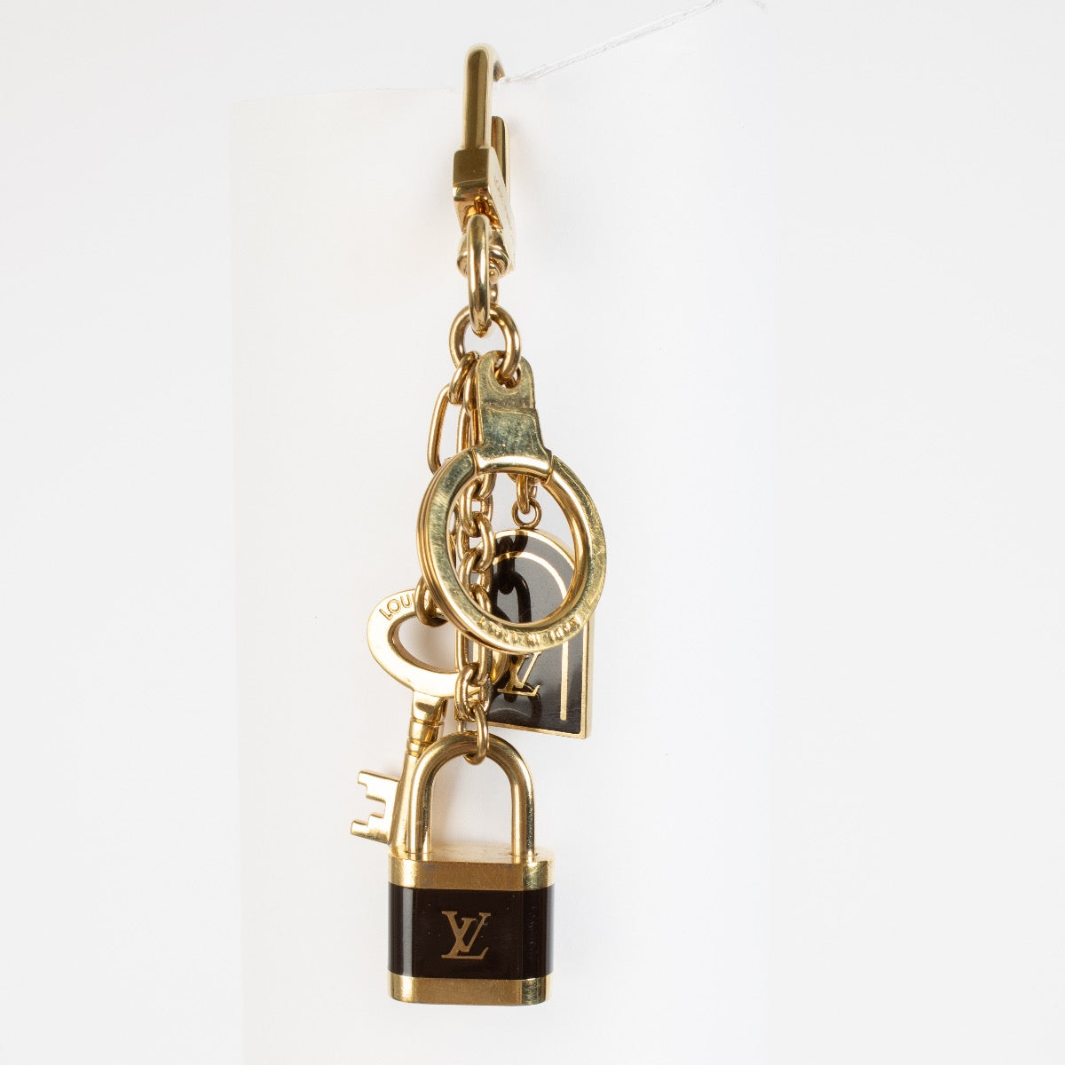 Shop 100% authentic secondhand Louis Vuitton Gold Lock Keychain on Labellov.com