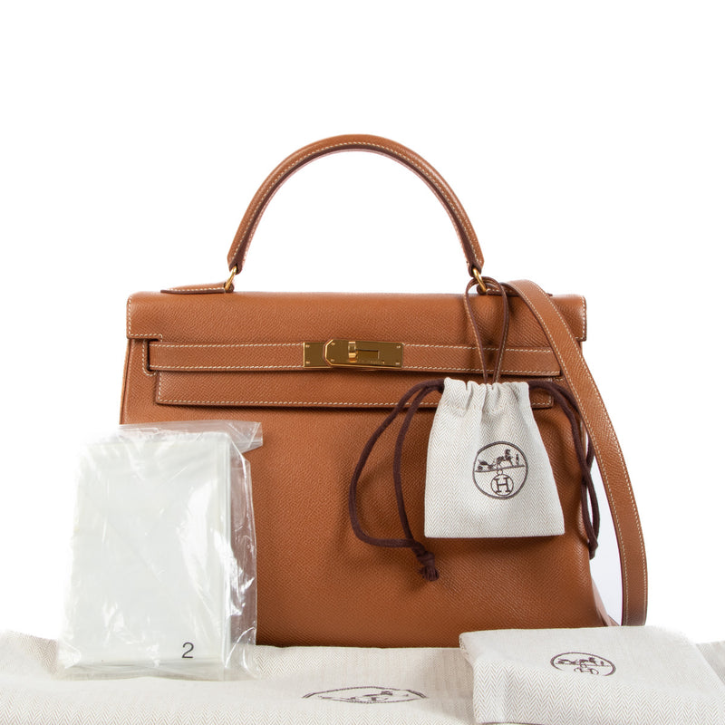 Are you looking to buy an authentic Hermès Kelly 32 Gold Courchevel GHW? We buy and sell your authentic designer bags for the best price.