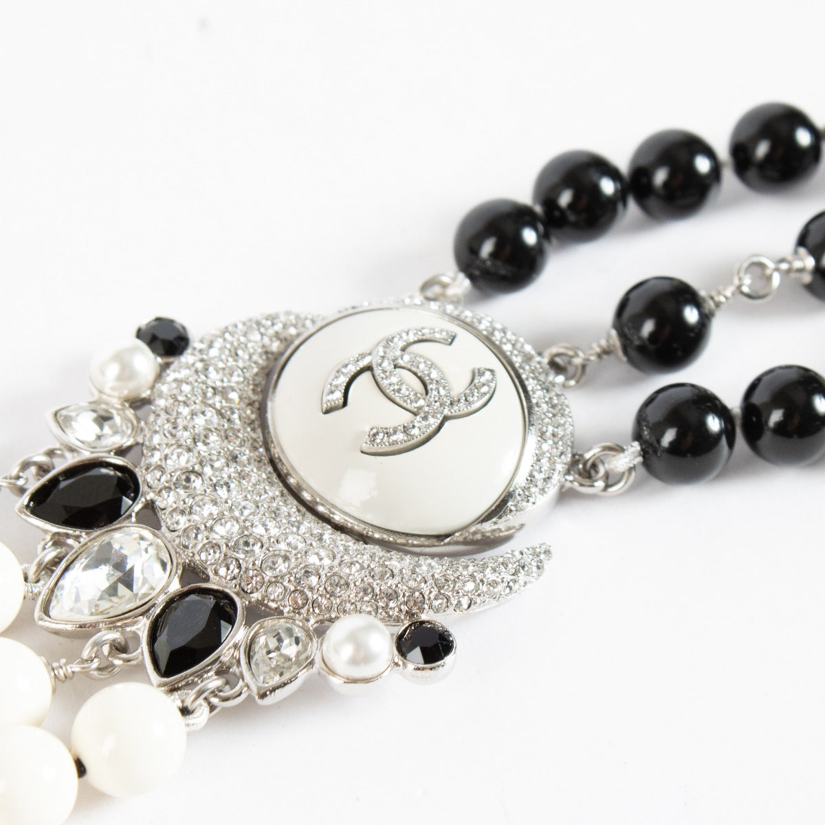 Chanel 22C CC Moon Bracelet with black and white beads at Labellov.com