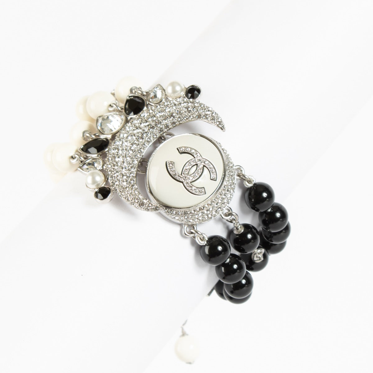 Chanel 22C CC Moon Bracelet with black and white beads at Labellov.com