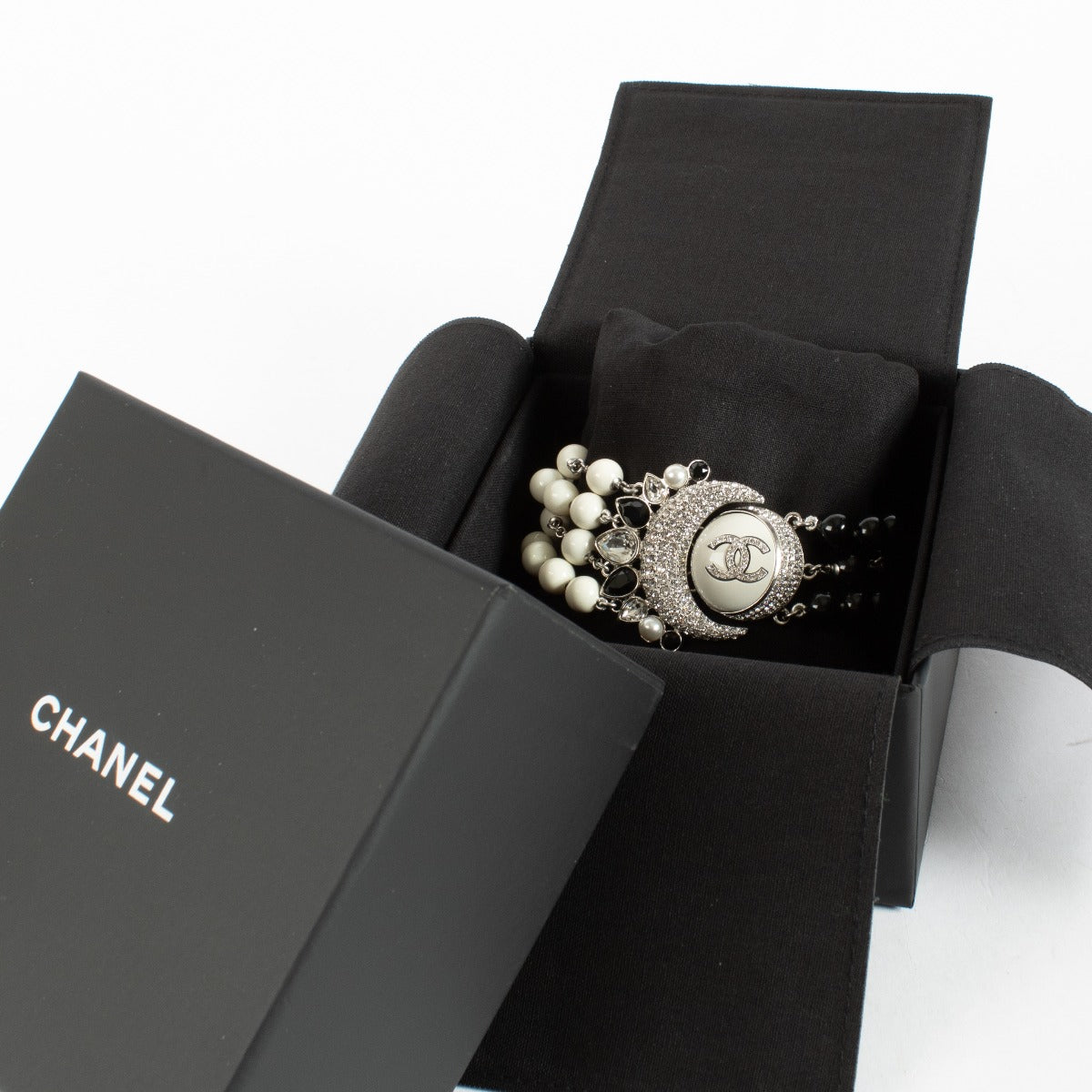 Chanel 22C CC Moon Bracelet with black and white beads at Labellov.com
