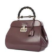 Shop safe online at Labellov in Antwerp, Brussels and Knokke this 100% authentic second hand Gucci Purple Leather Lady Lock Bamboo Top Handle Bag