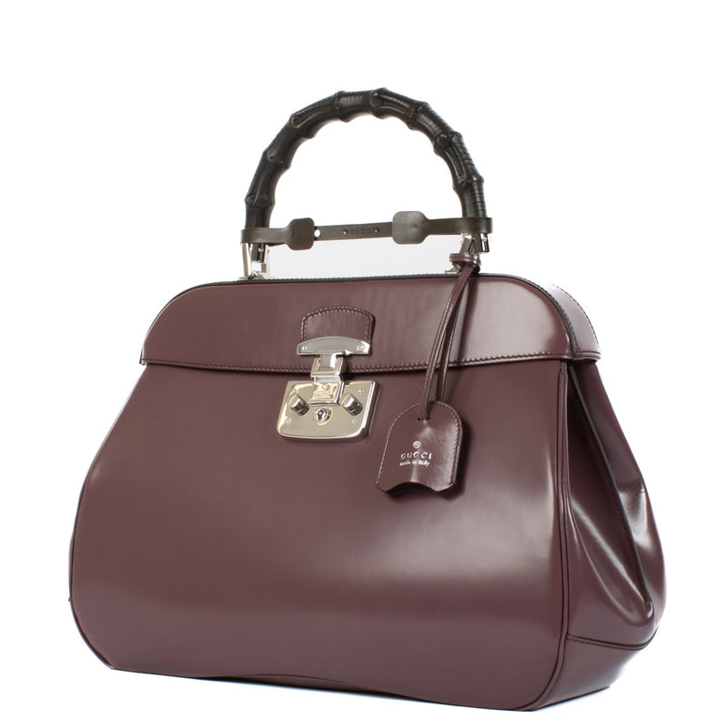 Shop safe online at Labellov in Antwerp, Brussels and Knokke this 100% authentic second hand Gucci Purple Leather Lady Lock Bamboo Top Handle Bag