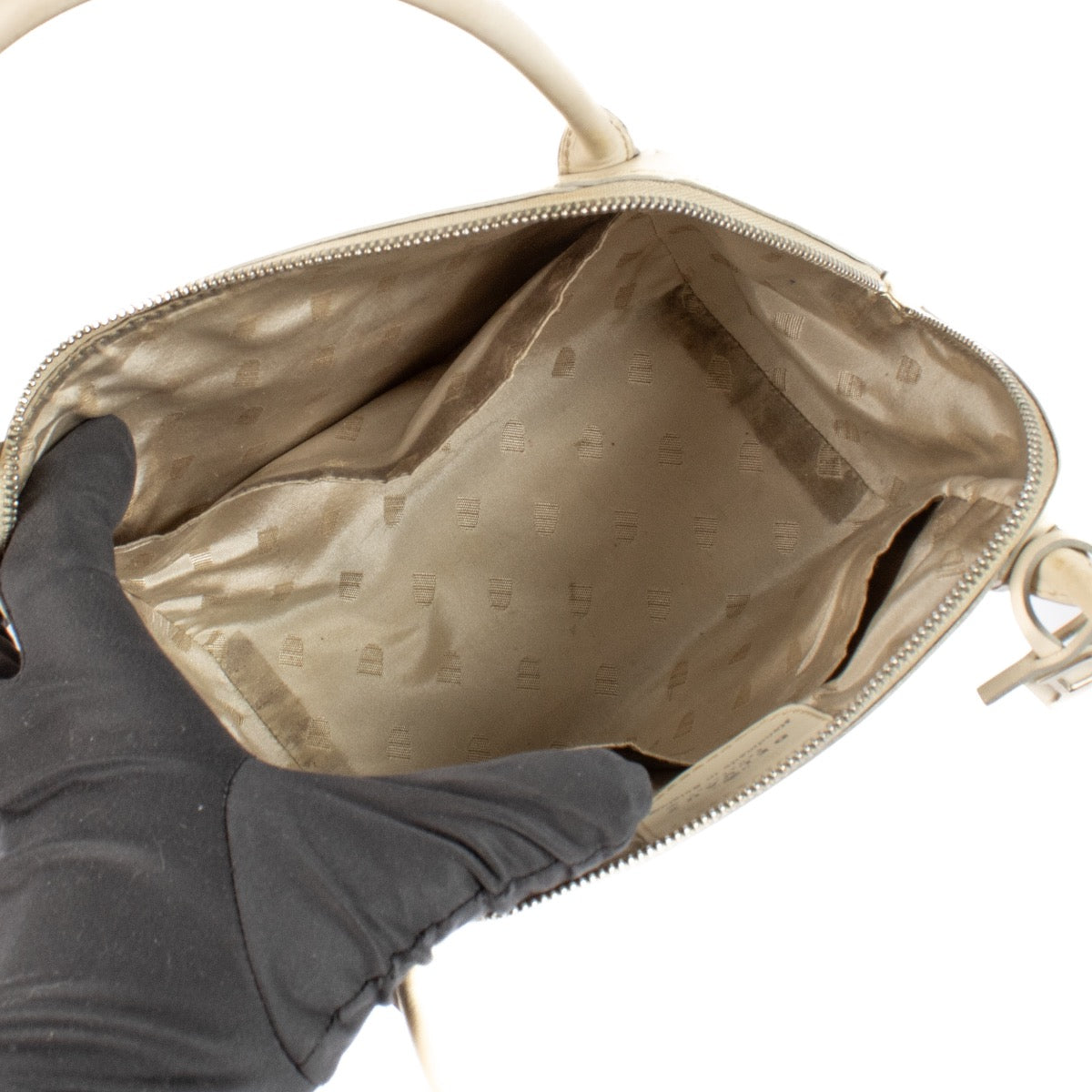 Shop safe online at Labellov in Antwerp and Knokke this 100% authentic second hand Delvaux Cream Mini Perle Top Handle Bag