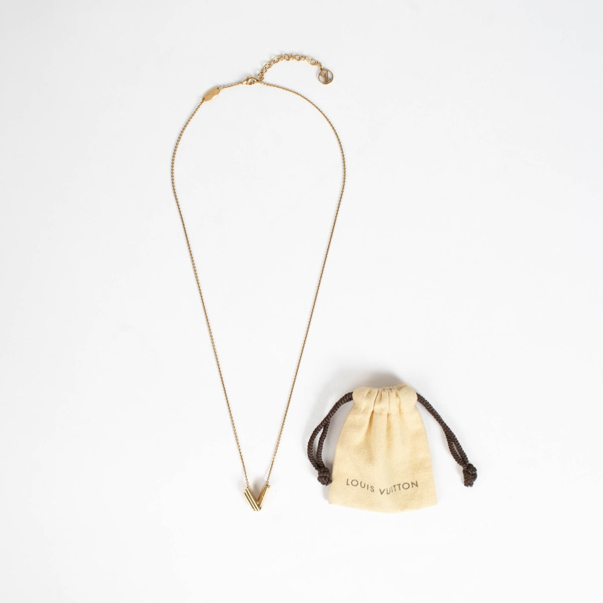 Authentic pre-loved Louis Vuitton Gold Tone Metal LV & Me V Necklace on Labellov.com