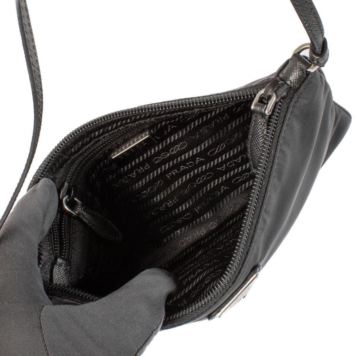 Shop safe online at Labellov in Antwerp, Brussels and Knokke this 100% authentic second hand Prada Black Nylon Mini Shoulder Bag