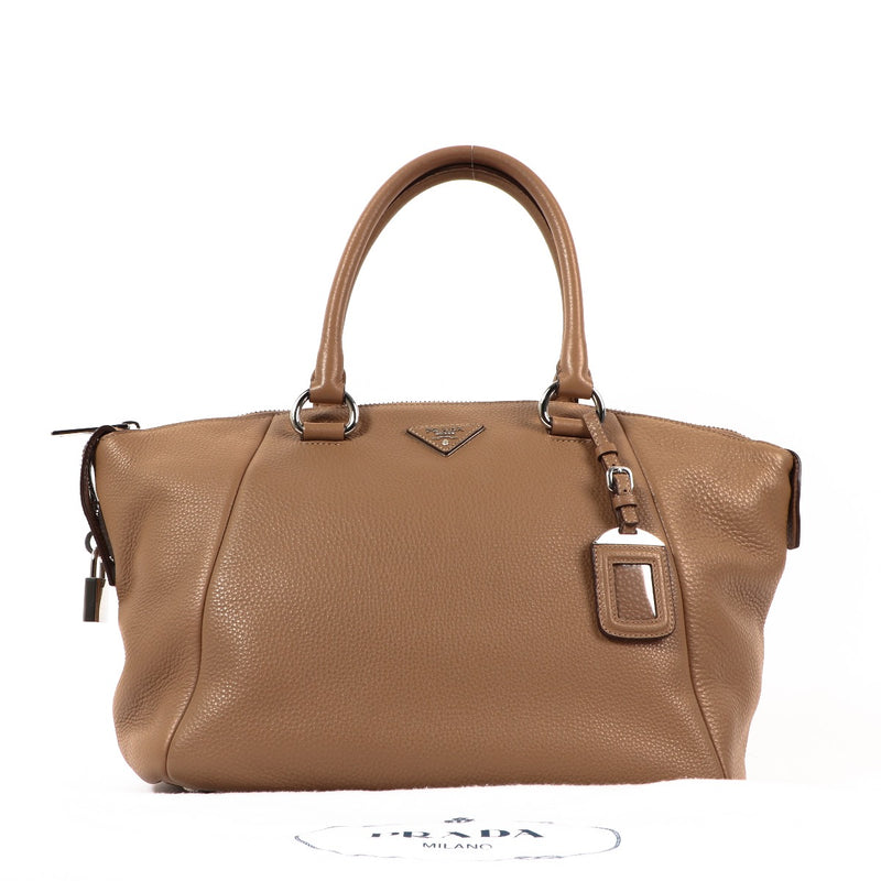 Buy an authentic second-hand Prada Beige Leather Top Handle Bag in very good condition at Labellov Antwerp