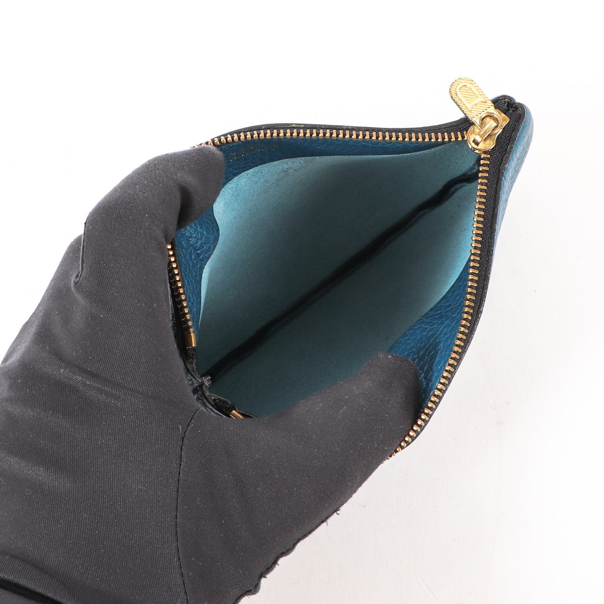 Buy an authentic second-hand Delvaux Blue Leather Pouch in very good condition at Labellov in Antwerp.