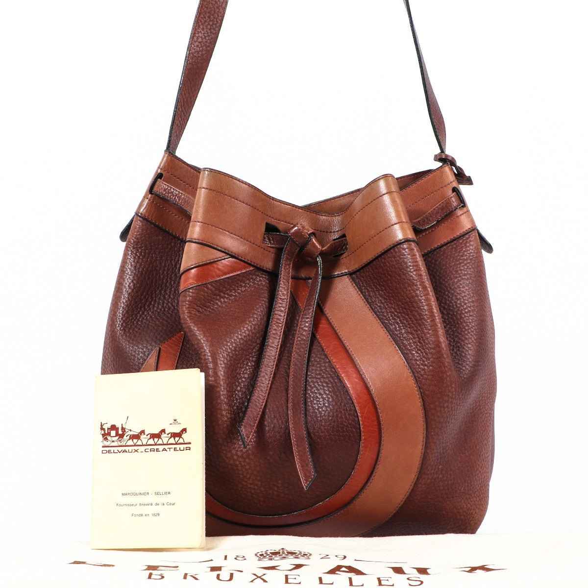 Sac bandoulière vintage en cuir marron Delvaux