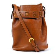 Shop safe online at Labellov Antwerp, Brussels and Knokke this 100% authentic second hand Delvaux Calicot Cognac Trotteur Bucket Bag