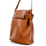 Shop safe online at Labellov Antwerp, Brussels and Knokke this 100% authentic second hand Delvaux Calicot Cognac Trotteur Bucket Bag