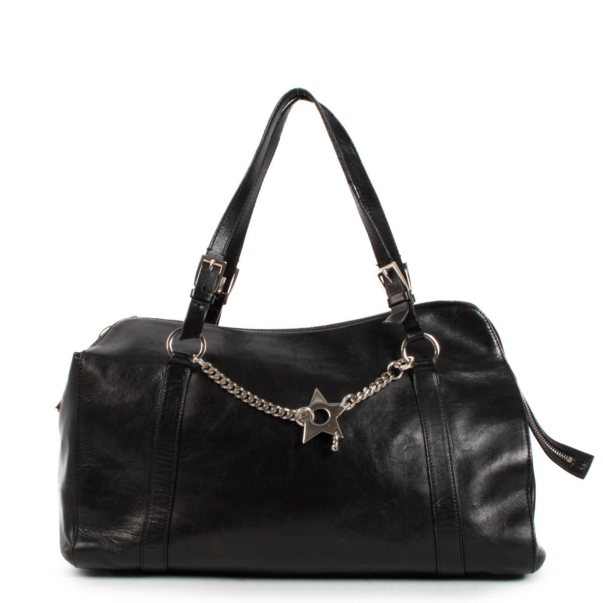Christian Dior Black Hardcore Star Piercing Tote Bag for the best price at Labellov secondhand luxury in Antwerp. We buy and sell your preloved and new designer bags for the best price.