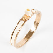authentic preloved Hermès Crème/Rose Gold Mini Clic Kelly Bracelet - size GM on Labellov.com