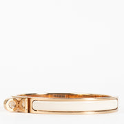 authentic preloved Hermès Crème/Rose Gold Mini Clic Kelly Bracelet - size GM on Labellov.com