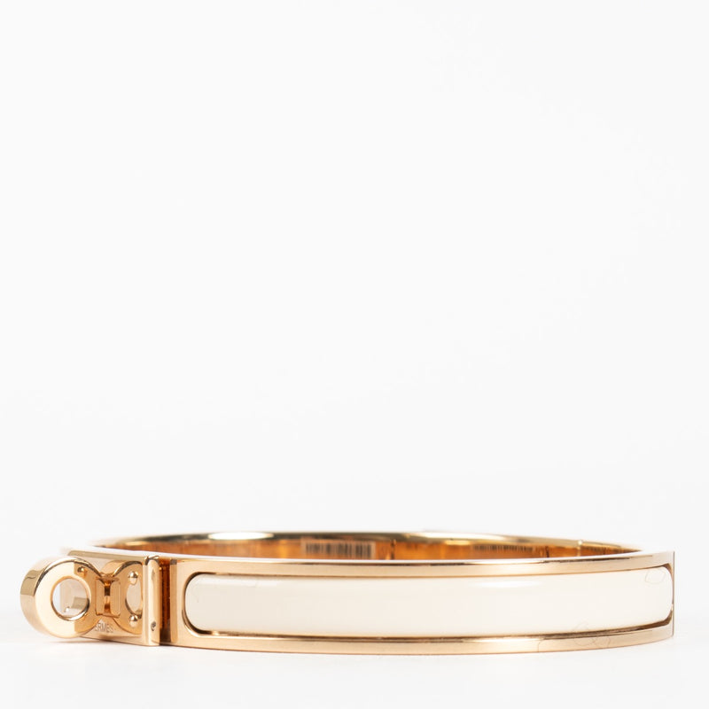 authentic preloved Hermès Crème/Rose Gold Mini Clic Kelly Bracelet - size GM on Labellov.com