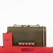 Authentic pre-loved Valentino Garavani Green Leather Va Va Vroom Chain Clutch on Labellov.com