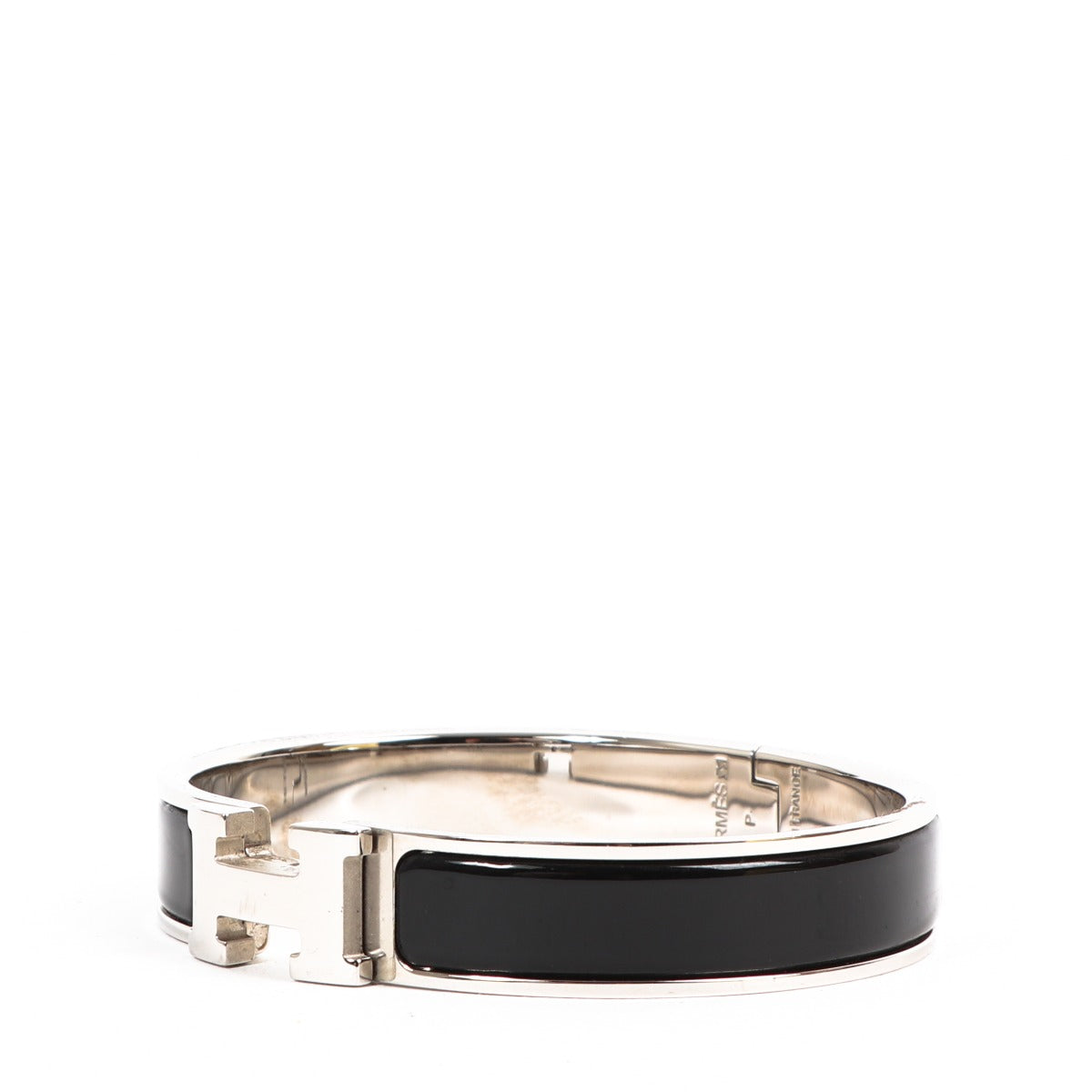 Buy an authentic second-hand Hermès Black Metal Clic Clac Bracelet in very good condition at Labellov in Antwerp.