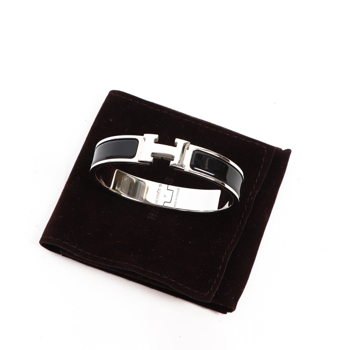 Buy an authentic second-hand Hermès Black Metal Clic Clac Bracelet in very good condition at Labellov in Antwerp.