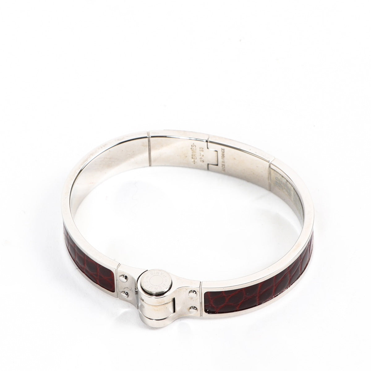 Buy a Hermès Alligator Charnière Cuir Palladium - Plated Hinged Bracelet in very good condition at Labellov in Antwerp.